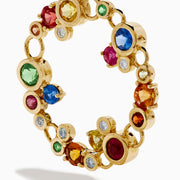 Watercolors 14K Gold Multi Sapphire and Diamond Dangle Bubble Earrings feature two linked open circles adorned with blue, green, yellow, pink, red, and clear sapphires plus diamonds for an eye-catching pop of color.
