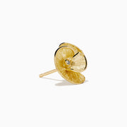 A pair of 14K yellow gold stud earrings featuring a flower design accented with a diamond at the center, displayed on a white background.