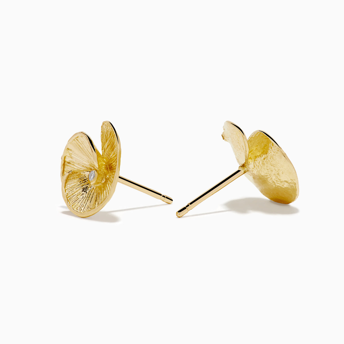 A pair of 14K yellow gold stud earrings featuring a flower design accented with a diamond at the center, displayed on a white background.