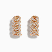 A pair of Pave Rose 14K Rose Gold Diamond Huggie Earrings featuring an intricate braided design and sparkling white diamonds, showcased against a white background.