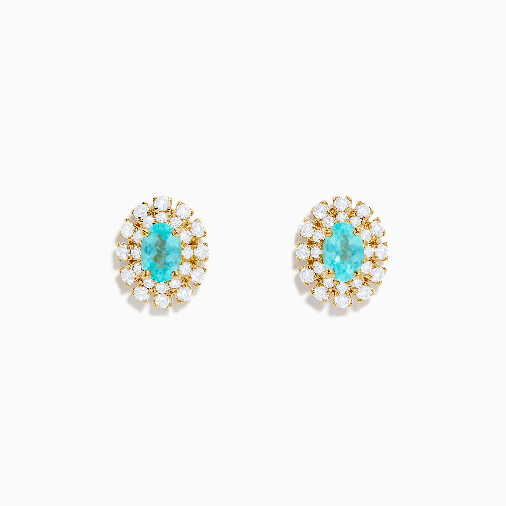 A pair of 18K Yellow Gold Paraiba and Diamond Stud Earrings featuring an oval Paraiba gemstone at the center, surrounded by a halo of small clear diamonds, displayed on a white background.