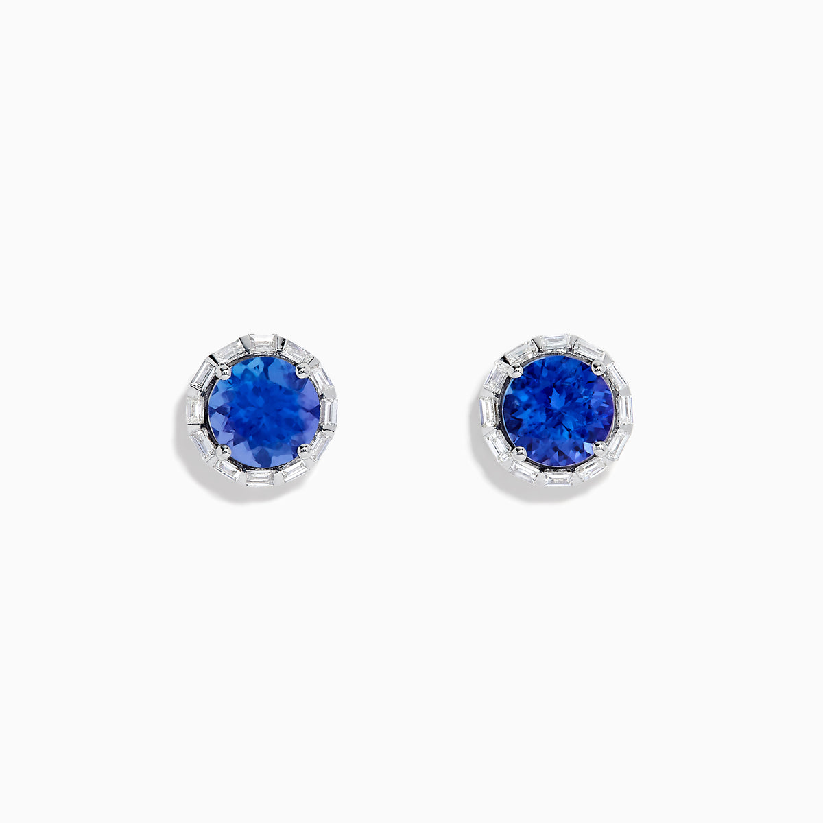The Nahla Siri 14K White Gold Tanzanite and Diamond Stud Earrings feature vivid blue tanzanite centers surrounded by sparkling diamonds in a classic round stud design.