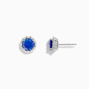 The Nahla Siri 14K White Gold Tanzanite and Diamond Stud Earrings feature vivid blue tanzanite centers surrounded by sparkling diamonds in a classic round stud design.