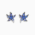 925 Sterling Silver Tanzanite and Diamond Starfish Earrings with blue gemstone clusters and black accents, displayed on a white background.