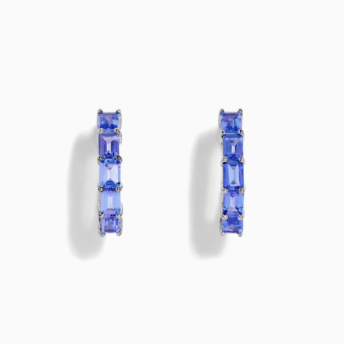 Nahla 925 Sterling Silver Tanzanite Hoop Earrings, each featuring five rectangular blue gemstones, are showcased against a white background.