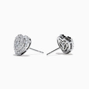 The 925 Sterling Silver Diamond Heart Earrings feature sparkling diamonds set in heart shapes, crafted from 925 silver and shown on a white background.