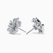 The 14K White Gold Diamond Flower Stud Earrings feature sparkling diamond-encrusted petals in a blossom design for timeless elegance.