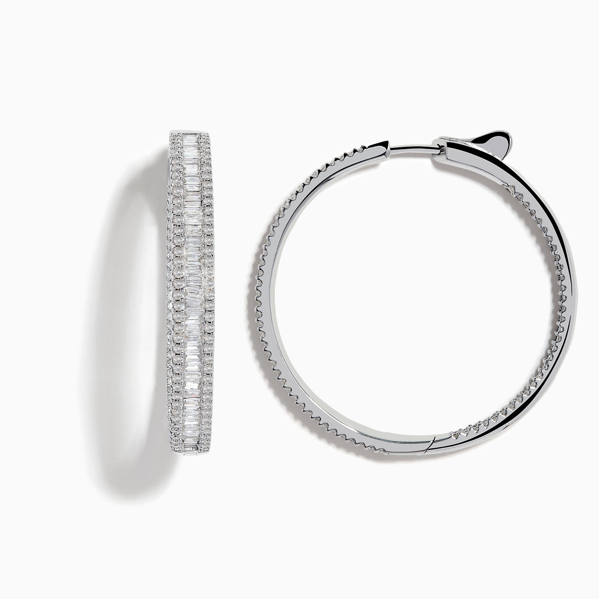 The Pave Classica 14 Karat White Gold Diamond 1.25 Hoop Earrings feature sparkling white diamonds totaling 2.24 TCW, set in elegant oval-shaped hoops and shown against a plain white background.