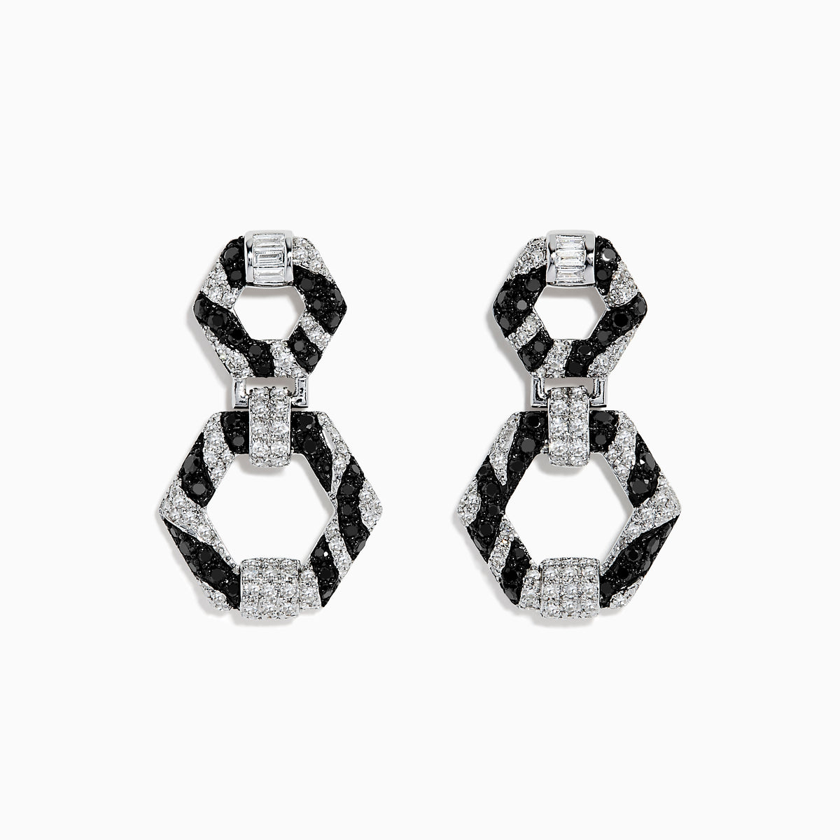 Showcased on a white background, these 14k White Gold Black and White Diamond Zebra Print Earrings feature alternating black and silver hexagonal segments encrusted with sparkling stones.