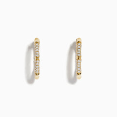 The DOro 14 Karat Yellow Gold 5/8 Diamond Bamboo Hoop Earrings, featuring sparkling diamonds in a bamboo-inspired design, are displayed on a plain white background.