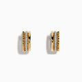 A pair of 14K Yellow Gold 1/2 Diamond Huggie Earrings (0.13 TCW) featuring textured gold beads and sparkling white stones, displayed against a plain white background.