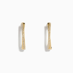 The DOro 14K Yellow Gold Diamond Hoop Earrings feature a subtle curve and sparkling diamonds along the front edge, beautifully showcased against a plain white background.