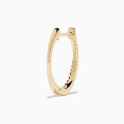 The DOro 14K Yellow Gold Diamond Hoop Earrings feature a subtle curve and sparkling diamonds along the front edge, beautifully showcased against a plain white background.