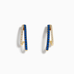 The Royal Bleu 14K Yellow Gold Sapphire and Diamond Double Hoop Earrings feature a zigzag design with sparkling sapphires and white stones, shown against a white background.