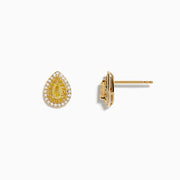 The 14K Yellow Gold White and Yellow Diamond Pear Stud Earrings feature teardrop shapes with double halos of white stones, capturing timeless elegance. Shown against a plain white background.