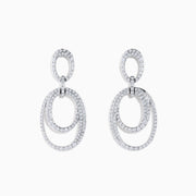 The Pave Classica 14K White Gold Diamond Earrings feature three interlocking oval hoops set with sparkling white diamonds, elegantly crafted in 14K white gold and displayed against a plain white background.