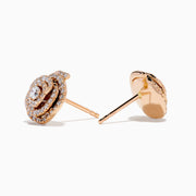 The Pave Rose 14K Rose Gold Diamond Stud Earrings feature multiple concentric rows of sparkling white diamonds in intricate spiral patterns. Perfect elegant stud earrings for any occasion, displayed on a white background.