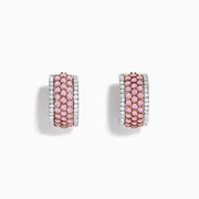 The 14K Two Tone Gold White and Pink Diamond Huggie Earrings feature three rows of small pink gemstones bordered by clear stones on each side, all set in shimmering gold.