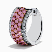 The 14K Two Tone Gold White and Pink Diamond Huggie Earrings feature three rows of small pink gemstones bordered by clear stones on each side, all set in shimmering gold.