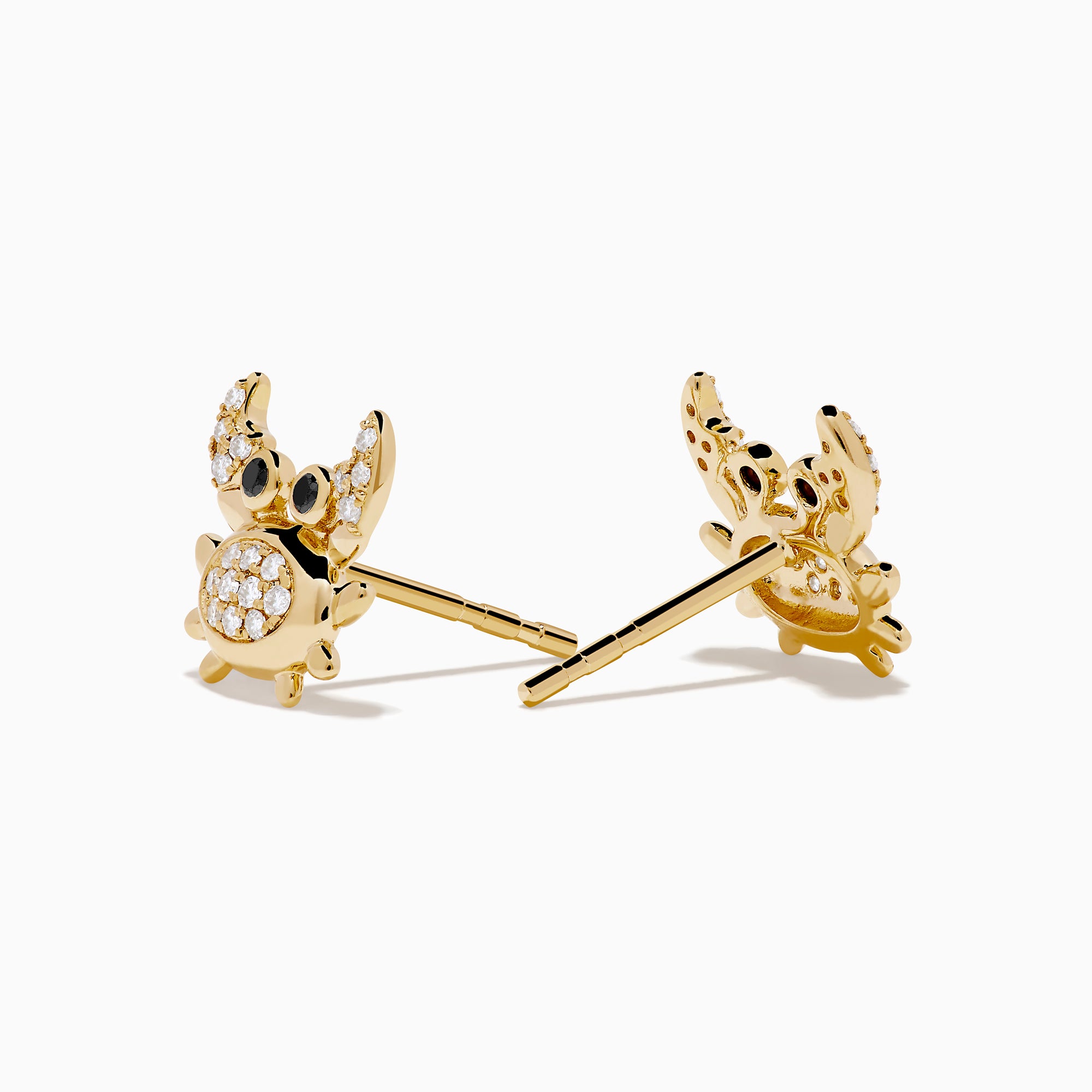 Seaside 14K Yellow Gold White & Black Diamond Crab Earrings, featuring sparkling bodies and striking black eyes, are shaped like crabs and displayed on a white background.