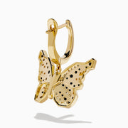 14K Yellow Gold Black and White Diamond Butterfly Earrings featuring a hoop design and geometric crystal pattern on the wings, shown against a white background.