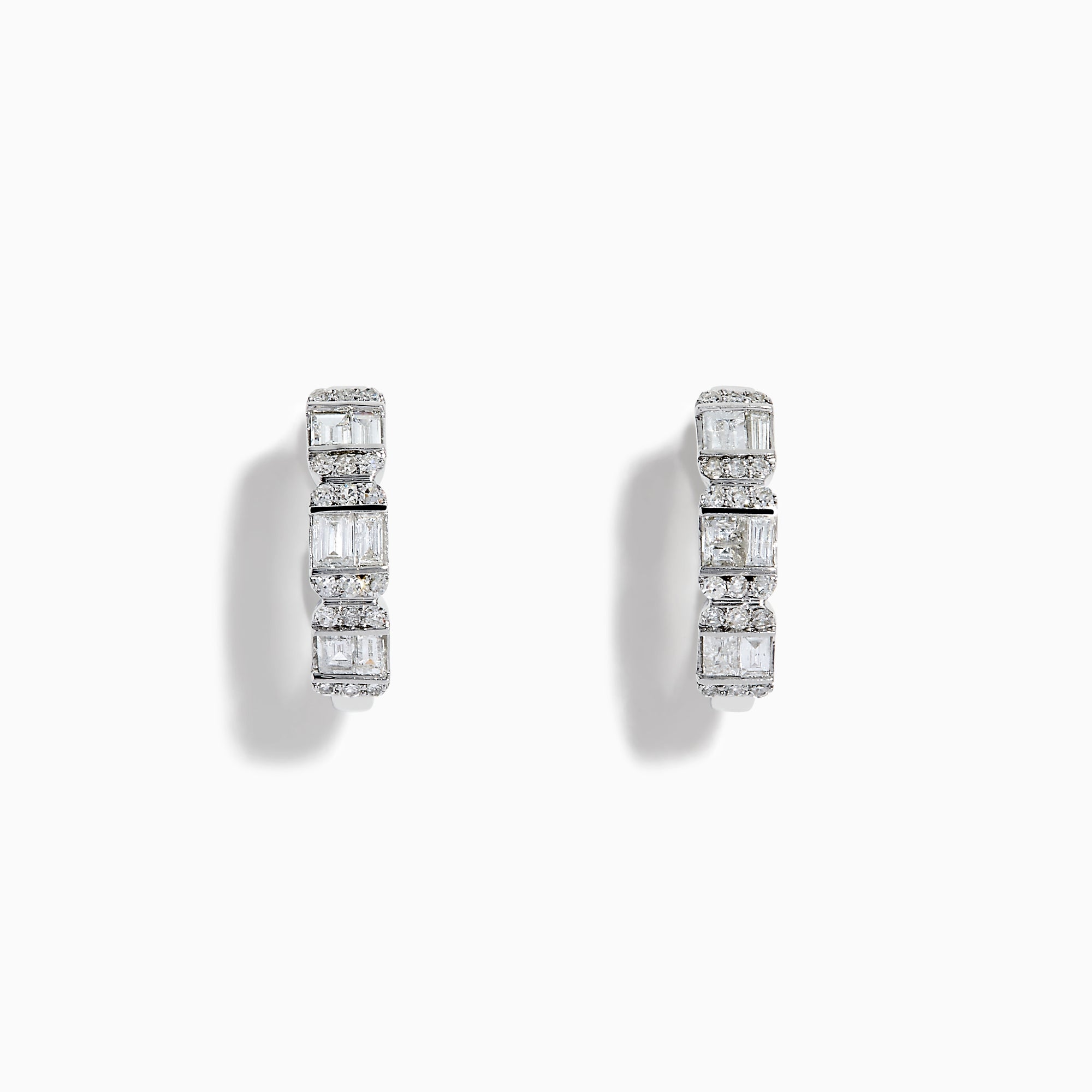 A pair of Classique 14K White Gold Diamond Hoop Earrings, featuring rectangular and round clear gemstones, shown on a white background with soft shadows to the left of each earring.