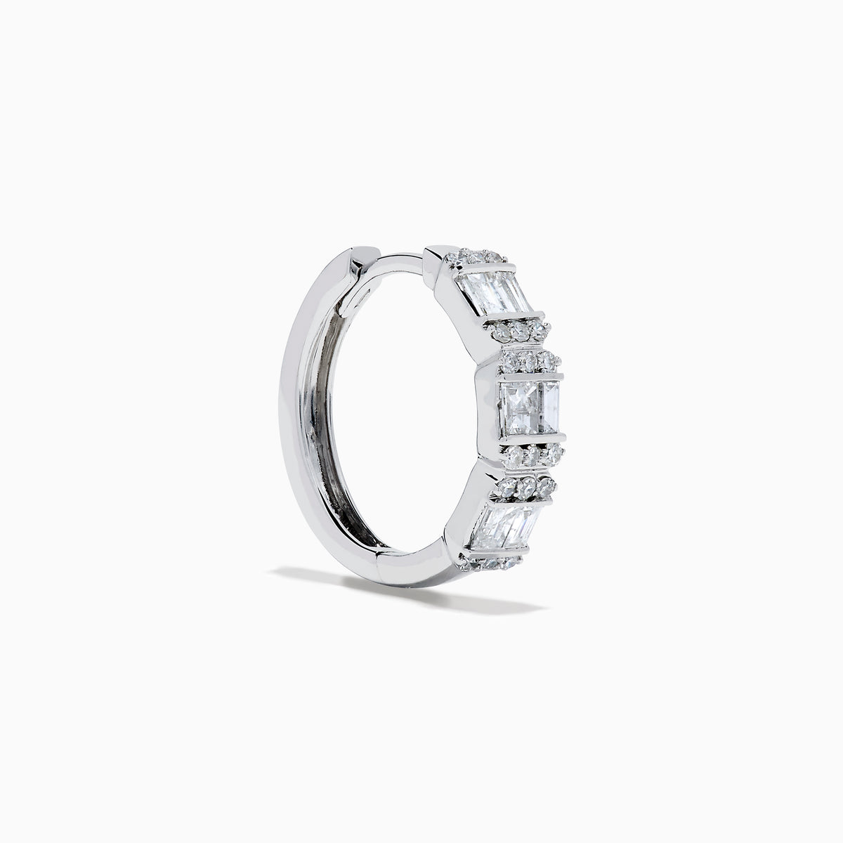 A pair of Classique 14K White Gold Diamond Hoop Earrings, featuring rectangular and round clear gemstones, shown on a white background with soft shadows to the left of each earring.