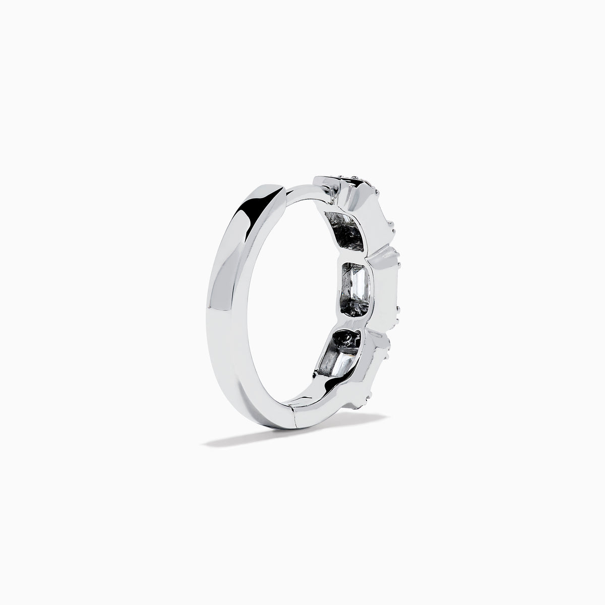 A pair of Classique 14K White Gold Diamond Hoop Earrings, featuring rectangular and round clear gemstones, shown on a white background with soft shadows to the left of each earring.