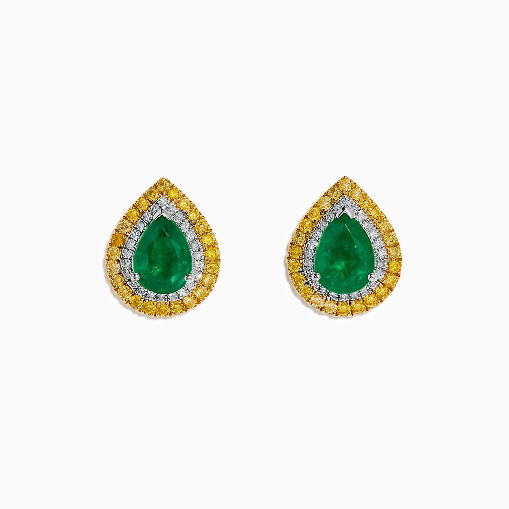 These 14K two tone gold emerald double halo earrings feature white and yellow diamonds in a teardrop design, elegantly displayed against a plain white background.