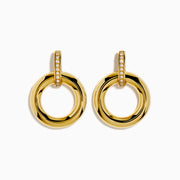 The 14K Yellow Gold Diamond Accented Circle Drop Earrings feature circular hoops with diamond accents on the upper bar, shown against a white background.