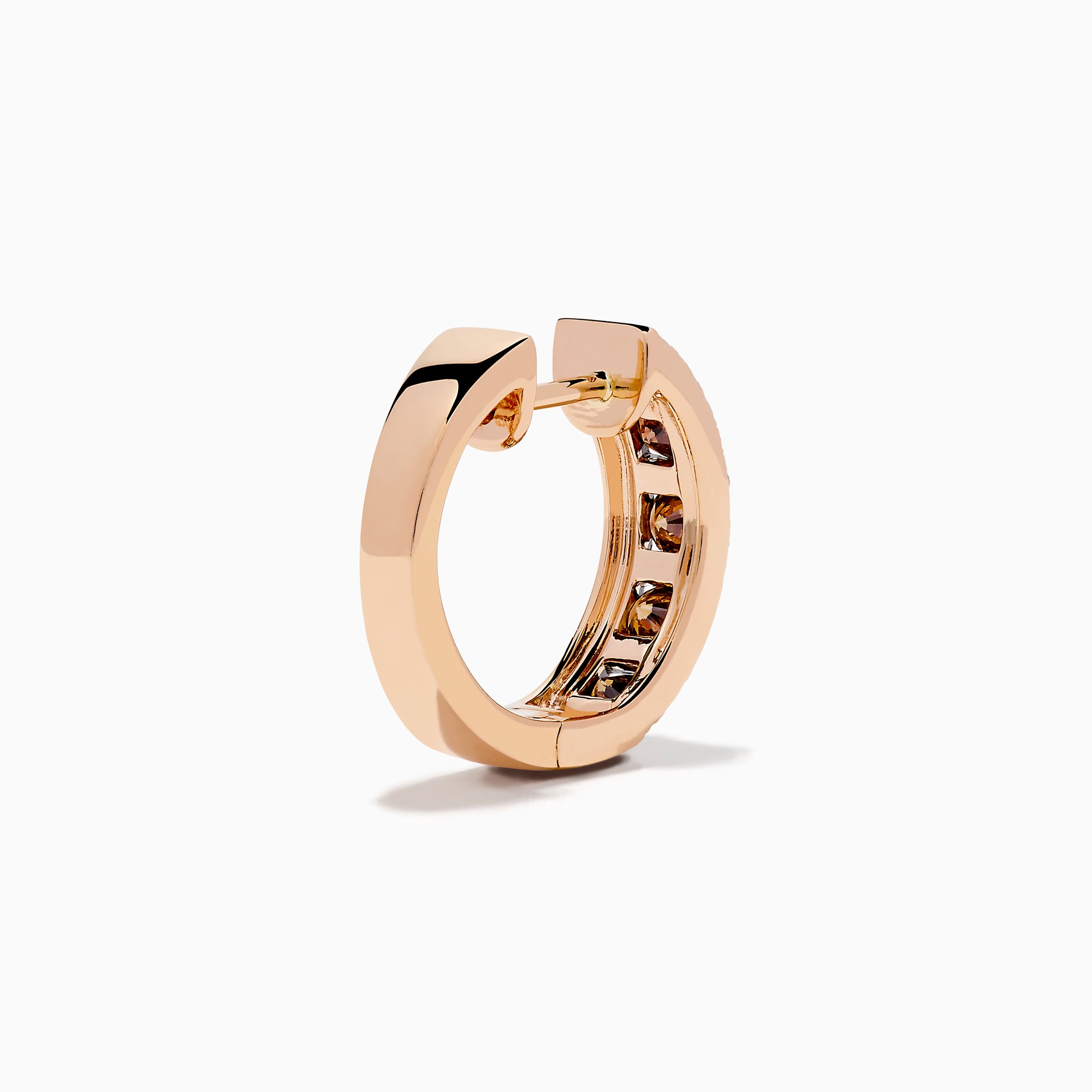 The 14K Rose Gold Brown and White Diamond Hoop Earrings feature a row of round brown and white diamonds in the center, bordered by small clear stones on each side, displayed against a white background.