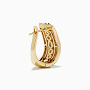 The 14K Yellow Gold Emerald and Diamond Hoop Earrings feature two rows of white diamonds, a central row of oval green gemstones, and a wavy design—ideal for fans of elegant emerald hoops.