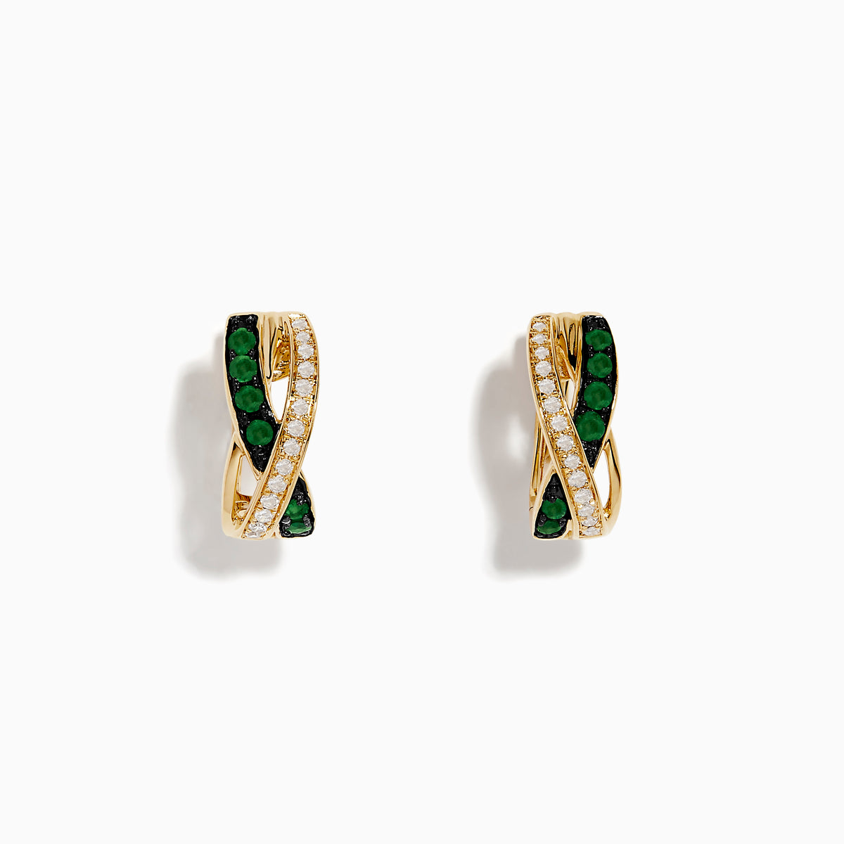 Displayed on a white background, the 14K Yellow Gold Emerald and Diamond Crossover Hoop Earrings (1/2) feature a crisscross design with rows of sparkling diamonds and vivid emerald stones in each earring.