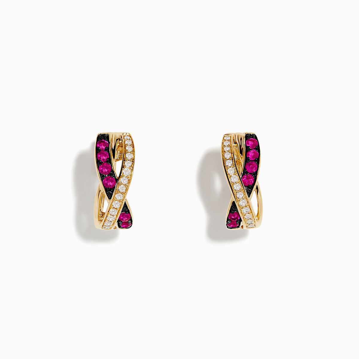 The Ruby Royale 14K Yellow Gold Ruby Crossover 1/2 Hoop Earrings feature intertwined bands with sparkling white diamonds and vivid rubies, showcased on a white background.