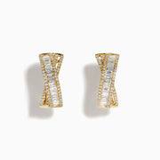The D'Oro 14K Yellow Gold Diamond Criss Cross Small Hoop Earrings, adorned with rows of sparkling diamonds, are displayed against a plain white background.
