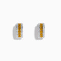 The Canare 14K Two Tone Gold Yellow and White Diamond Huggie Earrings showcase a central row of yellow diamonds bordered by two rows of white diamonds, all set in a striking two-tone gold design.