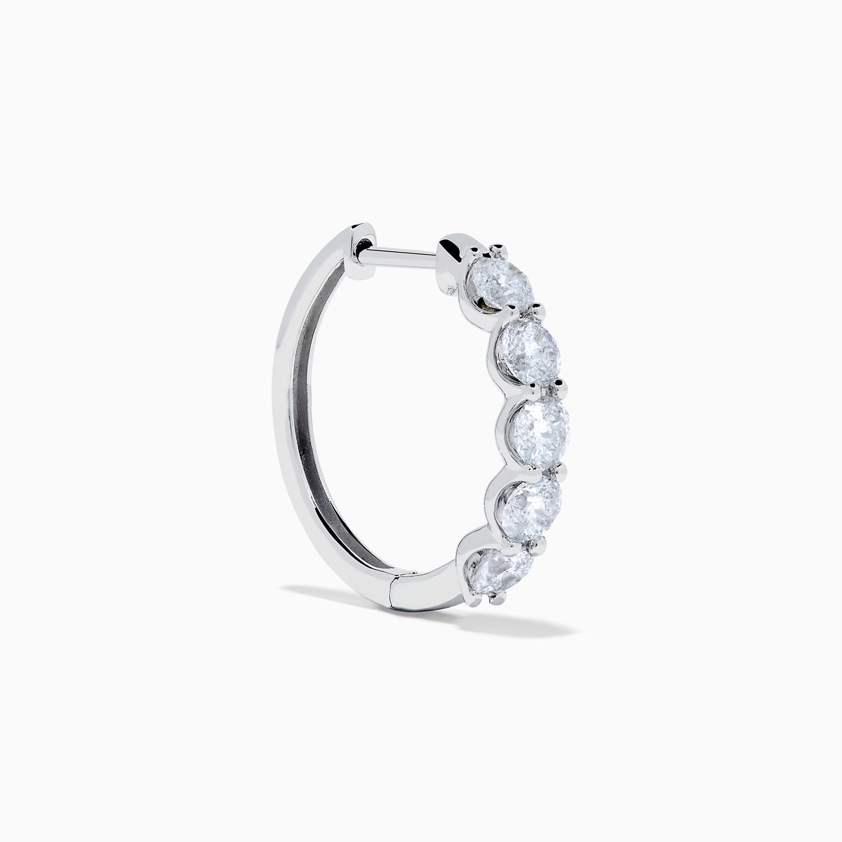 The Classique 14K White Gold Diamond Hoop Earrings feature five round diamonds on each hoop, shown against a white background for a timeless look.