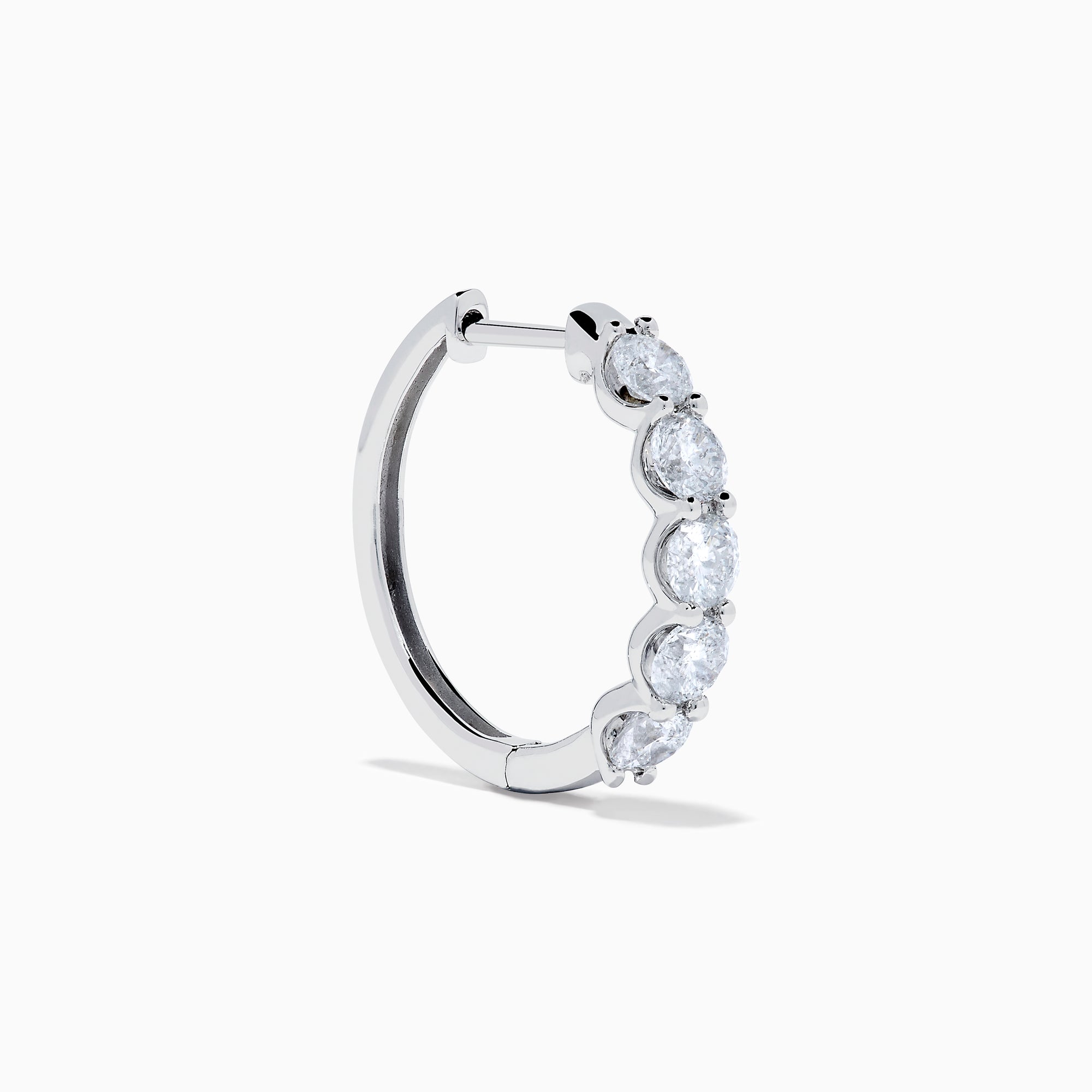 The Classique 14K White Gold Diamond Hoop Earrings feature five round diamonds on each hoop, shown against a white background for a timeless look.