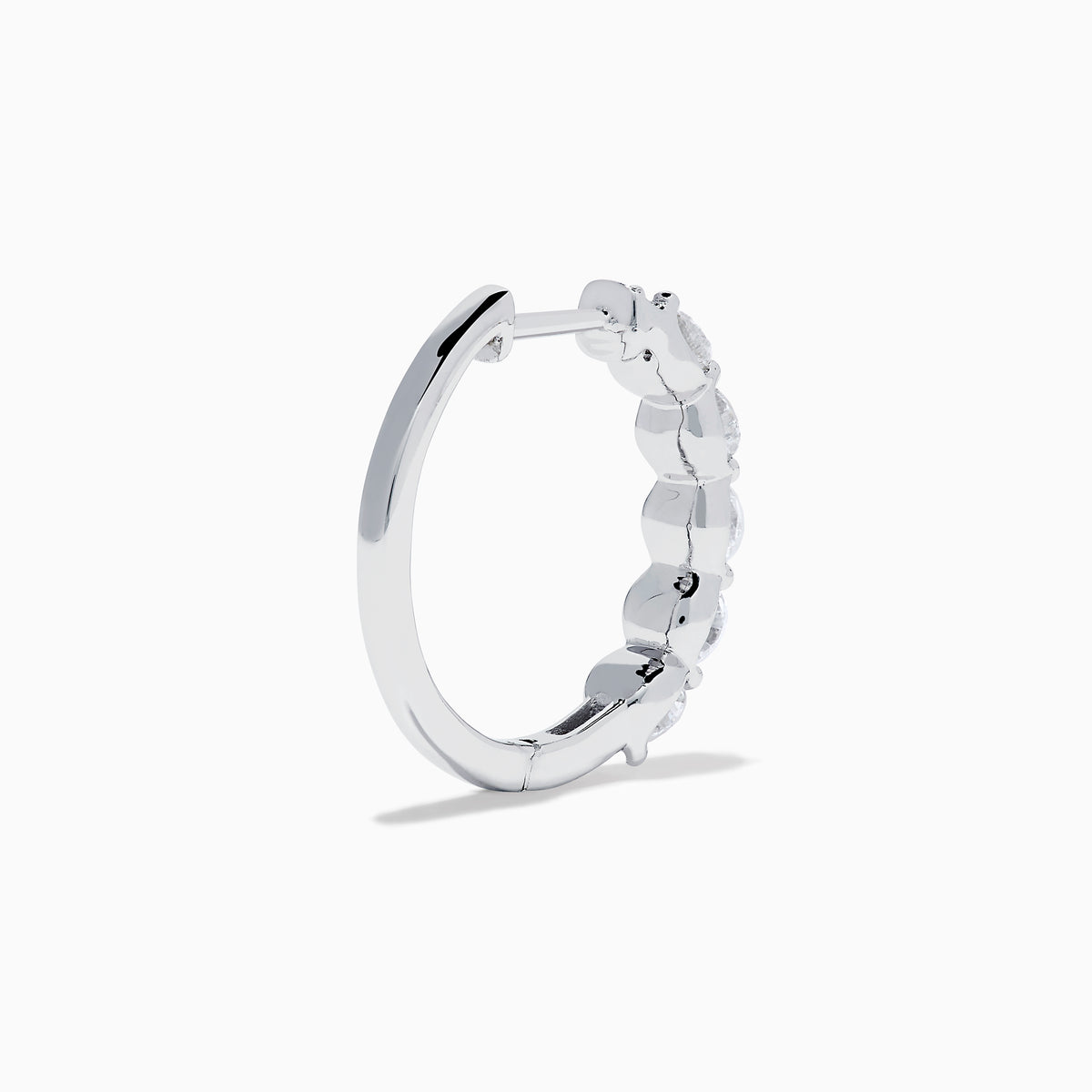 The Classique 14K White Gold Diamond Hoop Earrings feature five round diamonds on each hoop, shown against a white background for a timeless look.