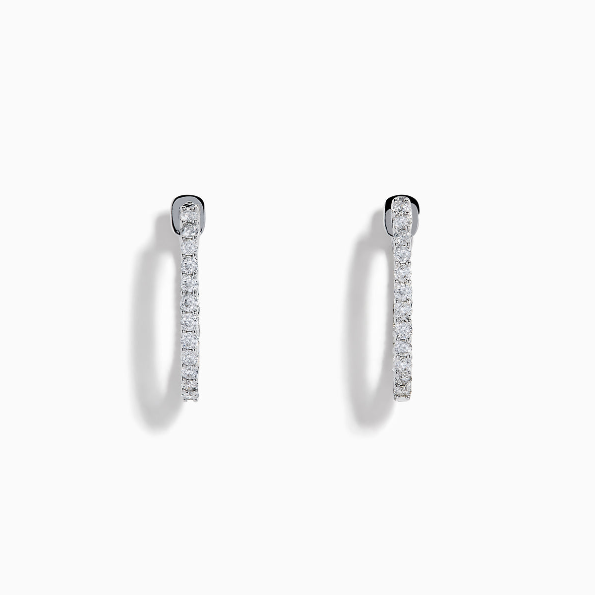 The 14K White Gold Pave Diamond Hoop Earrings 5/8" feature sparkling pave diamonds set in an elegant white gold hoop, displayed on a plain white background.