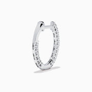 The 14K White Gold Pave Diamond Hoop Earrings 5/8" feature sparkling pave diamonds set in an elegant white gold hoop, displayed on a plain white background.
