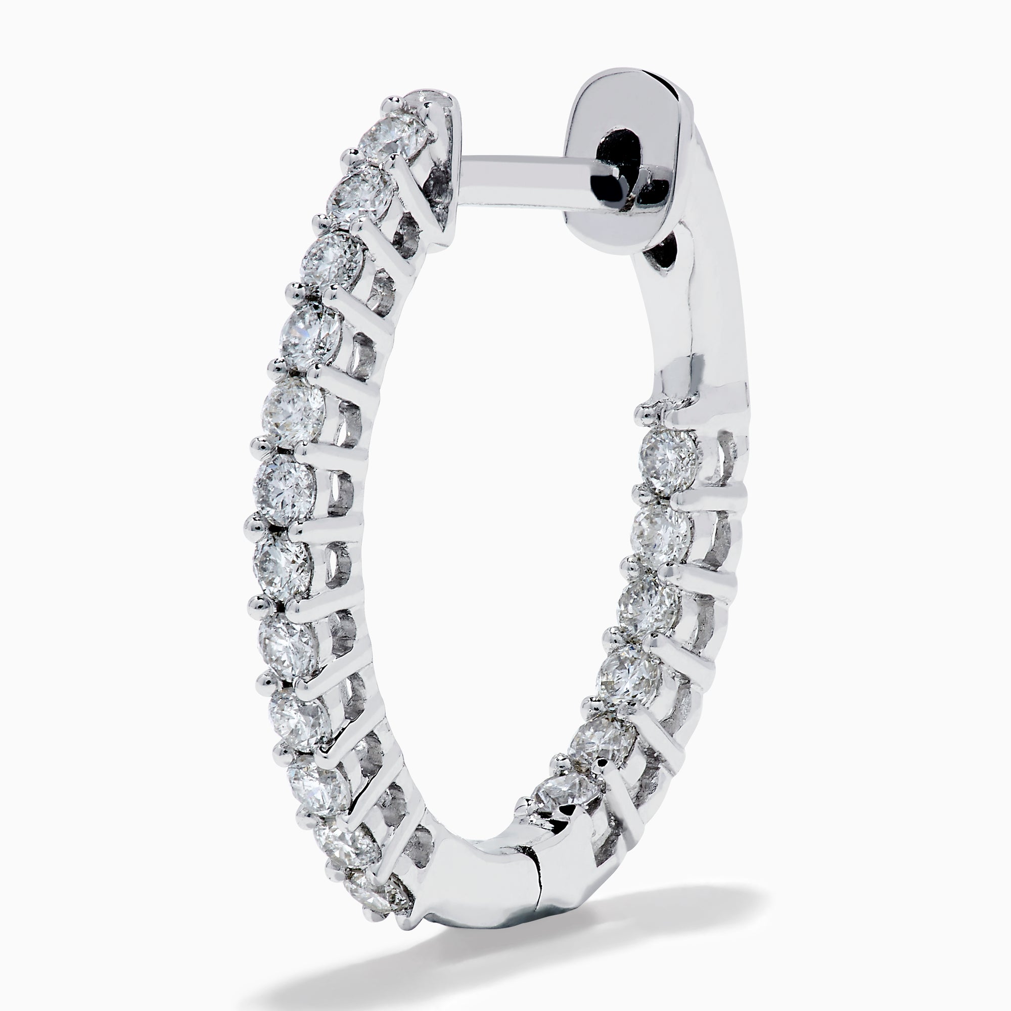 The 14K White Gold Pave Diamond Hoop Earrings 5/8" feature sparkling pave diamonds set in an elegant white gold hoop, displayed on a plain white background.