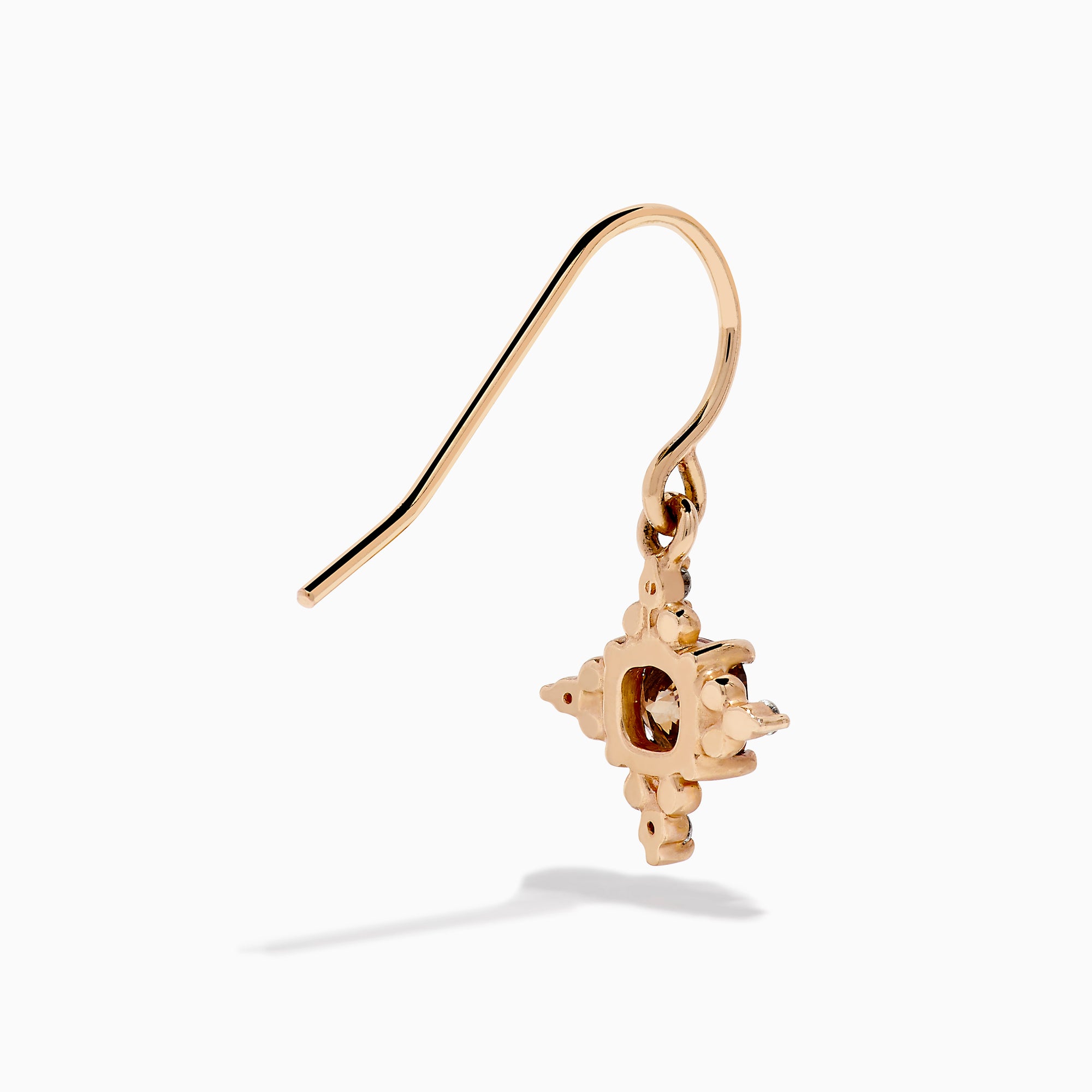 The 14K Rose Gold Brown and White Diamond Dangle Earrings feature a central brown diamond surrounded by white diamonds, each earring hanging from a simple rose gold hook.