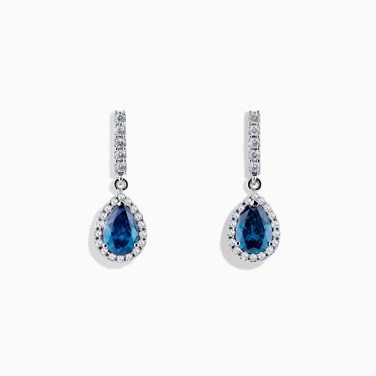 The Bella Bleu 14K White Gold Blue and White Diamond Earrings feature elegant teardrop-shaped blue stones, accented with white diamonds and additional details along the hooks, set in white gold-colored metal.