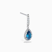 The Bella Bleu 14K White Gold Blue and White Diamond Earrings feature elegant teardrop-shaped blue stones, accented with white diamonds and additional details along the hooks, set in white gold-colored metal.