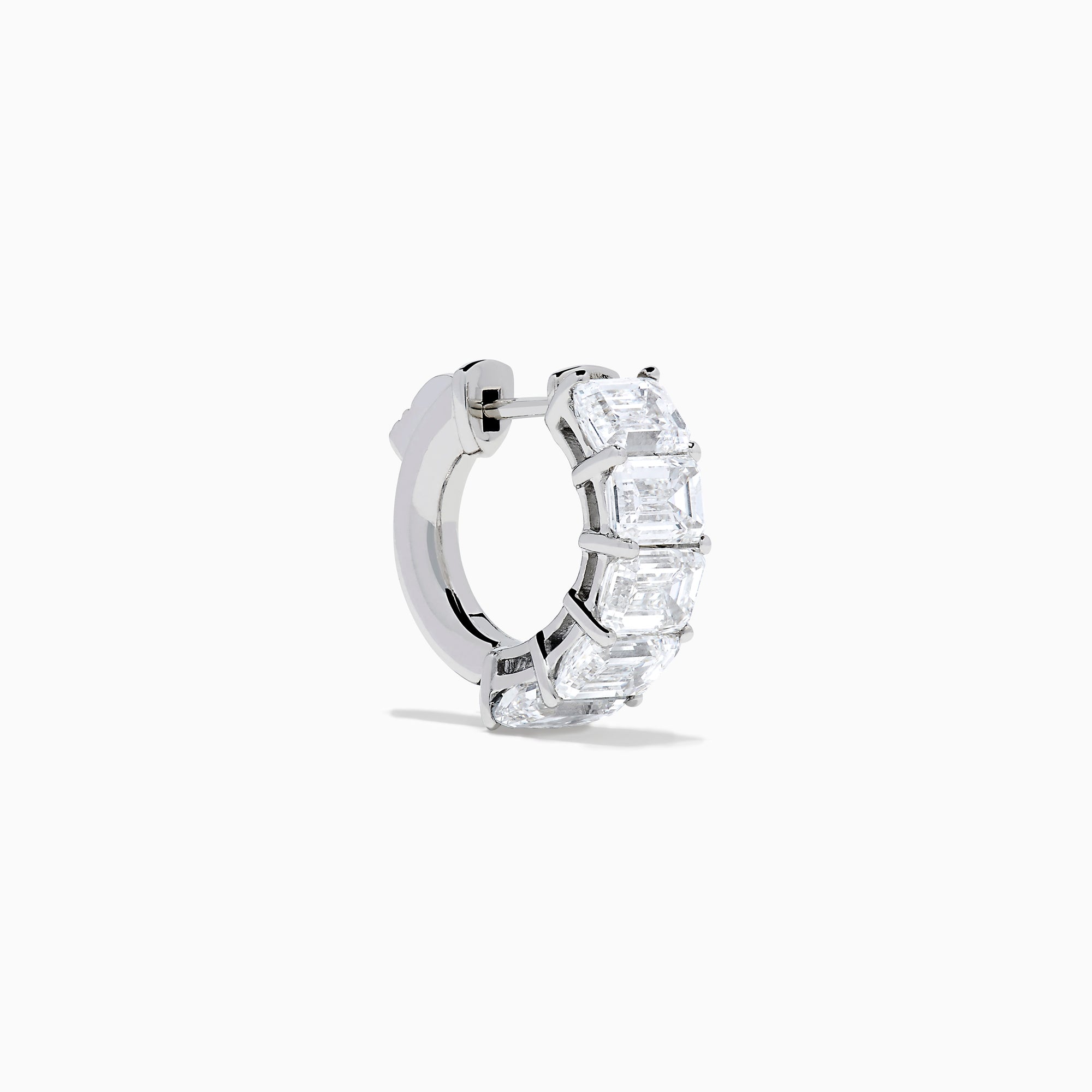 A pair of Lab Grown Emerald Cut Diamond Huggie Earrings in 14K white gold, each featuring three vertically-set rectangular clear stones, is displayed against a plain white background.