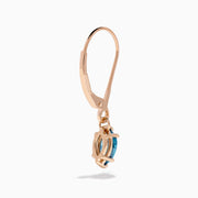 Introducing the Bella Bleu 14K Rose Gold Blue Diamond Drop Earrings, featuring marquise-cut blue diamonds and shown against a white background.