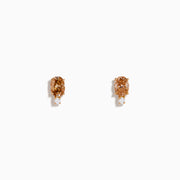 The 14K Rose Gold Brown and White Diamond Stud Earrings each feature an oval brown and white diamond above a small round gemstone, shown against a plain white background.