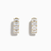 Lab Grown Emerald Cut Diamond Mini Hoop Earrings in 14K Yellow Gold, each featuring five emerald cut diamonds set in a row, are displayed against a white background.