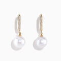 14K Yellow Gold Diamond, Fresh Water Pearl Earrings shown on a plain white background; each hoop is set with small clear diamonds and features a large freshwater pearl drop.